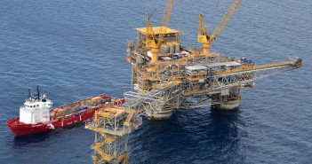 Woods takes Exxon tiller from Tillerson